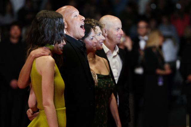 US actor Vin Diesel reacts as he poses with the team of the film "The Fast and the Furious" upon arrival arrive for its screening at the 79th edition of the Cannes Film Festival in Cannes, southern France on May 13, 2026. (Photo by Thibaud MORITZ / AFP)