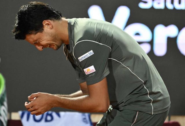 Italy's Luciano Darderi celebrates after winning against Spain's Rafael Jodar during the ATP Rome Open tennis tournament at Foro Italico in Rome on May 14, 2026. (Photo by Tiziana FABI / AFP)
