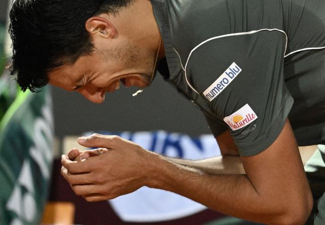Italy's Luciano Darderi celebrates after winning against Spain's Rafael Jodar during the ATP Rome Open tennis tournament at Foro Italico in Rome on May 14, 2026. (Photo by Tiziana FABI / AFP)