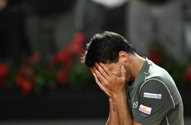 Italy's Luciano Darderi celebrates after winning against Spain's Rafael Jodar during the ATP Rome Open tennis tournament at Foro Italico in Rome on May 14, 2026. (Photo by Tiziana FABI / AFP)