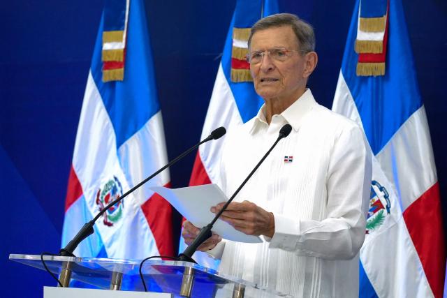 Dominican Republic's Foreign Affairs Minister Roberto Alvarez gives a press conference in Santo Domingo on May 13, 2026. The Dominican Republic said on May 13, 2026, it will temporarily receive people the United States wants to deport who are from third countries, except those from neighboring Haiti. (Photo by Danny Polaco / AFP)