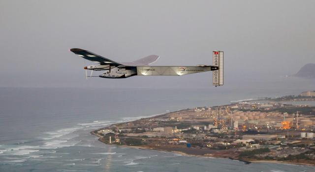 (FILES) The Solar Impulse 2 solar powered airplane flies off Kapolei, Hawaii, on March 3, 2016 on a all-day test flight. Bertrand Piccards pioneering aircraft, which completed a round-the-world flight in 2016 using electric batteries, crashed into the sea in the Gulf of Mexico after being converted into a drone, according to its owner in the United States. In July 2016, Solar Impulse 2 completed a historic round-the-world flight in Abu Dhabi, flying day and night on solar power and without a drop of fuel after a journey of 23 actual flight days and 43,041 km. (Photo by Eugene TANNER / AFP)