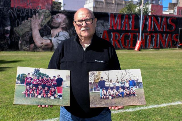 Antonio "Quique" Dominguez, former coach of Argentine footballer Lionel Messi in Newell's youth teams, shows photos of Messi with teammates at the Malvinas Argentinas children's football school in Rosario, Santa Fe province, Argentina, on April 30, 2026. At the age of 12, Lionel Messi ended the career of his first coach. When Enrique Dominguez stopped coaching him in 1999 at the youth club Malvinas Argentinas in the city of Rosario, he resigned, saying he had "already coached the best player in the world", who could now be set to play in his sixth World Cup. (Photo by Marcelo Manera / AFP)