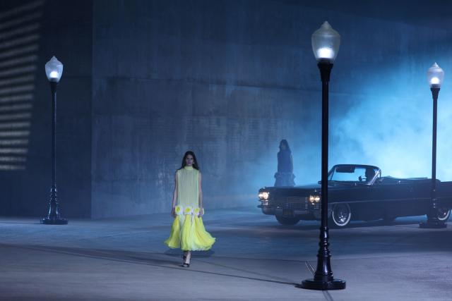 Models walk the runway during the Dior 2027 Cruise collection fashion show at the Los Angeles County Museum of Art (LACMA) in Los Angeles on May 13, 2026. (Photo by Patrick T. Fallon / AFP)