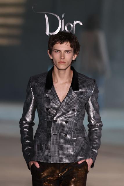 A model walks the runway during the Dior 2027 Cruise collection fashion show at the Los Angeles County Museum of Art (LACMA) in Los Angeles on May 13, 2026. (Photo by Patrick T. Fallon / AFP)