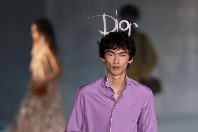 A model walks the runway during the Dior 2027 Cruise collection fashion show at the Los Angeles County Museum of Art (LACMA) in Los Angeles on May 13, 2026. (Photo by Patrick T. Fallon / AFP)