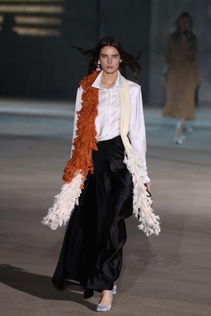 Models walk the runway during the Dior 2027 Cruise collection fashion show at the Los Angeles County Museum of Art (LACMA) in Los Angeles on May 13, 2026. (Photo by Patrick T. Fallon / AFP)