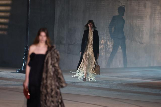 Models walk the runway during the Dior 2027 Cruise collection fashion show at the Los Angeles County Museum of Art (LACMA) in Los Angeles on May 13, 2026. (Photo by Patrick T. Fallon / AFP)