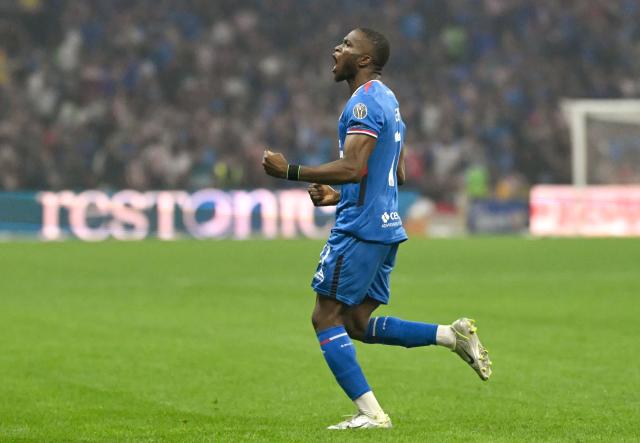 Cruz Azul's Nigerian forward #11 Christian Ebere celebrates after scoring the equalising goal from the penalty spot during the Liga MX Clausura semifinal first-leg football match between Cruz Azul and Guadalajara at Banorte Stadium in Mexico City on May 13, 2026. (Photo by CARL DE SOUZA / AFP)