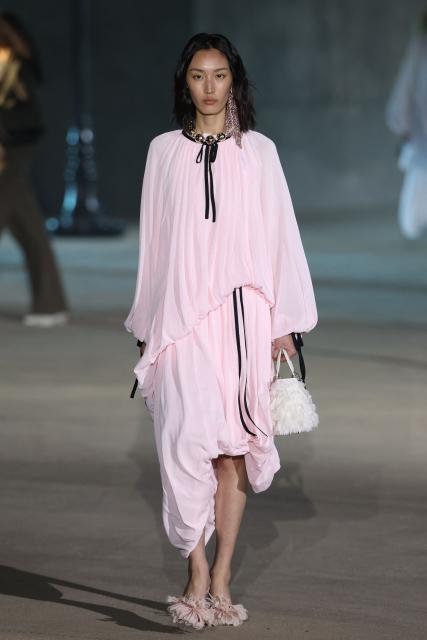 US model Xiru Yang walks the runway during the Dior 2027 Cruise collection fashion show at the Los Angeles County Museum of Art (LACMA) in Los Angeles on May 13, 2026. (Photo by Patrick T. Fallon / AFP)
