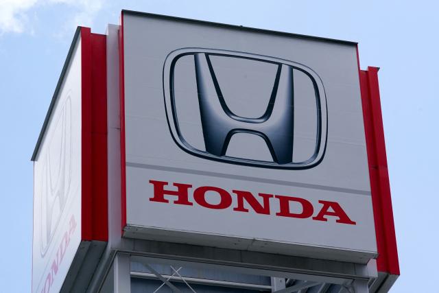 The logo of Japanese automaker Honda is pictured on a billboard at a Honda dealership in Tokyo on May 14, 2026. (Photo by Kazuhiro NOGI / AFP)