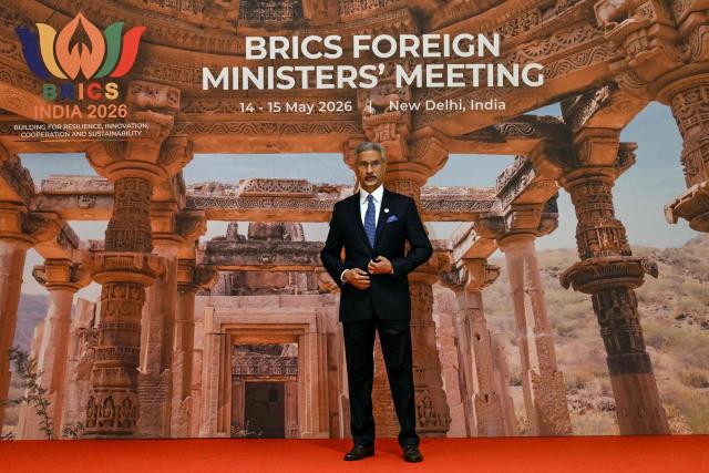 India's Foreign Minister Subrahmanyam Jaishankar gestures as he waits for delegates during the opening of the BRICS Foreign Ministers’ Meeting at the Bharat Mandapam in New Delhi on May 14, 2026. (Photo by Arun SANKAR / AFP)