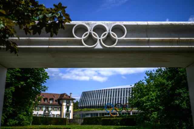 This photograph shows the Olympics Rings displayed near the headquarters of the International Olympic Committee (IOC) in Lausanne on May 13, 2026. (Photo by Fabrice COFFRINI / AFP)