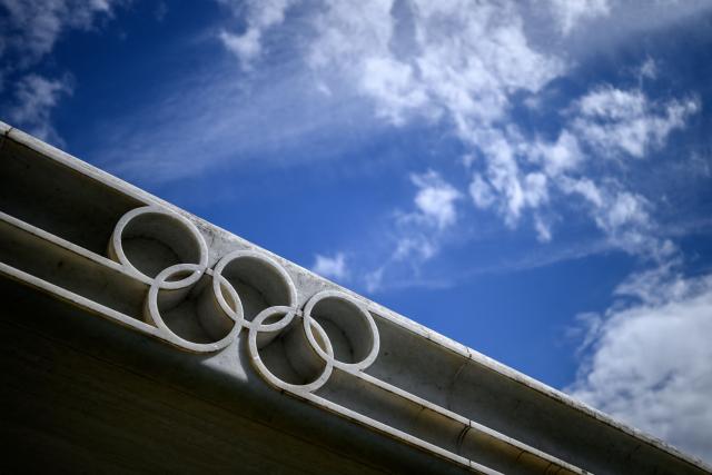 This photograph shows the Olympics Rings displayed near the headquarters of the International Olympic Committee (IOC) in Lausanne on May 13, 2026. (Photo by Fabrice COFFRINI / AFP)