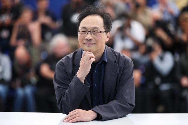 Japanese director and screenwriter Koji Fukada poses during a photocall of the film "Nagi Notes" at the 79th edition of the Cannes Film Festival in Cannes, southern France on May 14, 2026. (Photo by Valery HACHE / AFP)