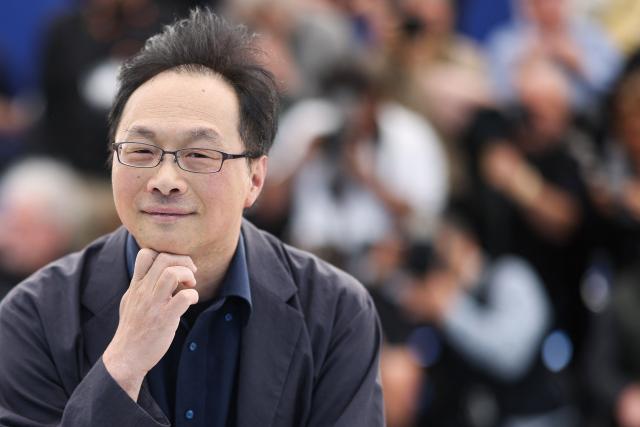 Japanese director and screenwriter Koji Fukada poses during a photocall of the film "Nagi Notes" at the 79th edition of the Cannes Film Festival in Cannes, southern France on May 14, 2026. (Photo by Valery HACHE / AFP)