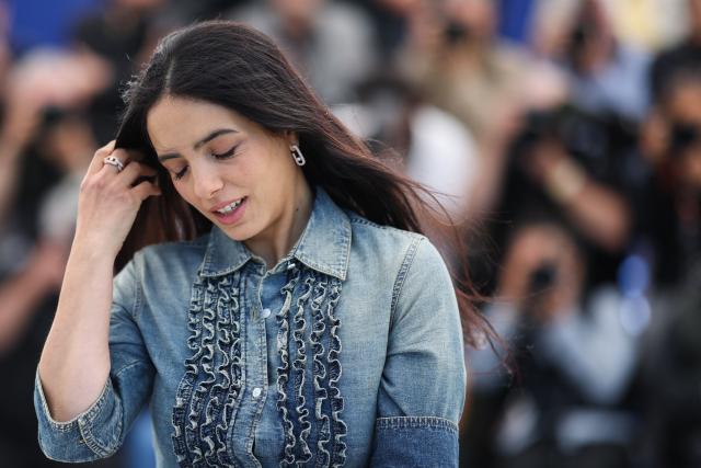 French actress Hafsia Herzi poses during a photocall of the film "Quelques mots d'amour" (Words of Love) at the 79th edition of the Cannes Film Festival in Cannes, southern France on May 14, 2026. (Photo by Valery HACHE / AFP)