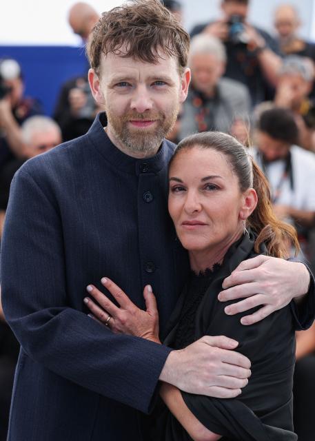 French actor Antoine Reinartz and sister of Samuel Paty Mickaelle Paty pose during a photocall of the film "L'Abandon" at the 79th edition of the Cannes Film Festival in Cannes, southern France on May 14, 2026. (Photo by Valery HACHE / AFP)