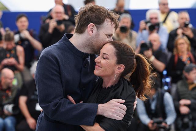 French actor Antoine Reinartz and sister of Samuel Paty Mickaelle Paty pose during a photocall of the film "L'Abandon" at the 79th edition of the Cannes Film Festival in Cannes, southern France on May 14, 2026. (Photo by Valery HACHE / AFP)