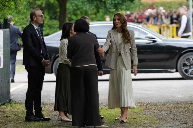 Britain's Catherine, Princess of Wales, arrives at  the Salvador Allende preschool to observe how nature-based learning is embedded within the Reggio Emilia approach, part of a two-day trip, in Reggio Emilia, Italy, on May 14, 2026. (Photo by Antonio Calanni / POOL / AFP)