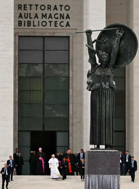 Pope Leo XIV leaves at the end of a visit to the Sapienza University of Rome, on May 14, 2026. (Photo by Andreas SOLARO / AFP)