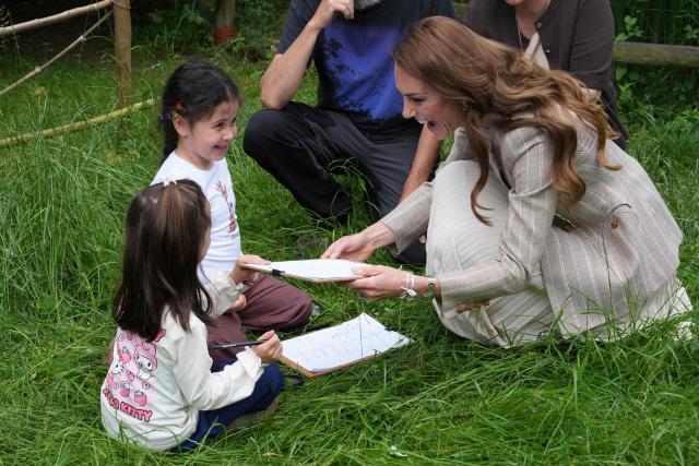 Britain's Catherine, Princess of Wales, visits the Salvador Allende preschool to observe how nature-based learning is embedded within the Reggio Emilia approach, part of a two-day trip, in Reggio Emilia, Italy, on May 14, 2026. (Photo by Antonio Calanni / POOL / AFP)