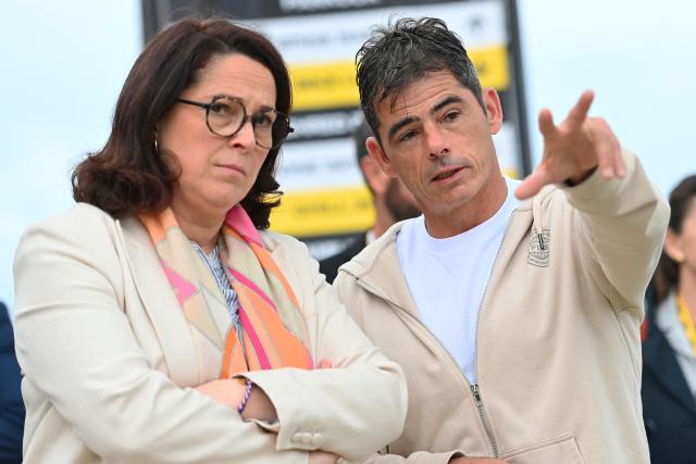 French founder of the FISE (Extreme Sports International Festival) Herve Andre-Benoit (R) speaks with France's Sports Minister Marina Ferrari (L) during a visit at the FISE (Extreme Sports International Festival) in Montpellier, southern of France, on May 14, 2026. (Photo by Sylvain THOMAS / AFP)