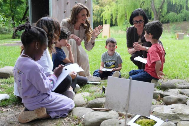 Britain's Catherine, Princess of Wales, meets with children as she visits the Salvador Allende preschool to observe how nature-based learning is embedded within the Reggio Emilia approach, part of a two-day trip, in Reggio Emilia, Italy, on May 14, 2026. (Photo by Antonio Calanni / POOL / AFP)