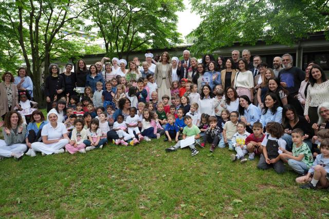 Britain's Catherine, Princess of Wales visits the Salvador Allende preschool to observe how nature-based learning is embedded within the Reggio Emilia approach, part of a two-day trip, in Reggio Emilia, Italy, on May 14, 2026. (Photo by Antonio Calanni / POOL / AFP)