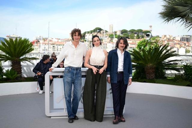 (FROM L) Canadian actor Vassili Schneider, Swiss actress Souheila Yacoub and French director Berenger Thouin pose during a photocall of the film "L’Age d'Or" (The Golden Age) at the 79th edition of the Cannes Film Festival in Cannes, southern France on May 14, 2026. (Photo by Olivier CHASSIGNOLE / AFP)