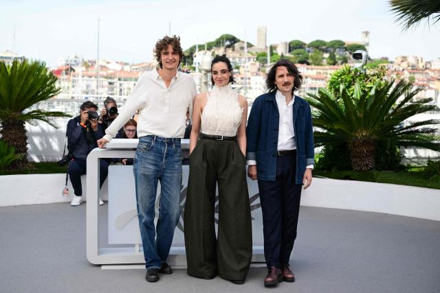 (FROM L) Canadian actor Vassili Schneider, Swiss actress Souheila Yacoub and French director Berenger Thouin pose during a photocall of the film "L’Age d'Or" (The Golden Age) at the 79th edition of the Cannes Film Festival in Cannes, southern France on May 14, 2026. (Photo by Olivier CHASSIGNOLE / AFP)