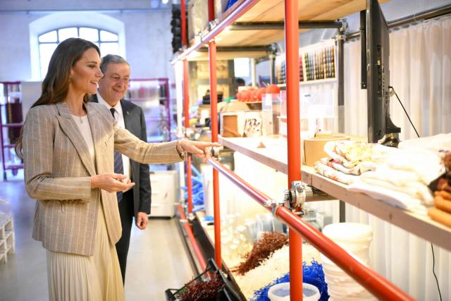 Britain's Catherine, Princess of Wales, visits REMIDA, Reggio Emilia’s creative resource centre, to learn how local businesses and the wider community support early childhood education through the Reggio Emilia Approach, on May 14, 2026. Established in 1996, REMIDA is a cultural project dedicated to sustainability, creativity and the re use of industrial surplus. (Photo by Marco BERTORELLO / POOL / AFP)