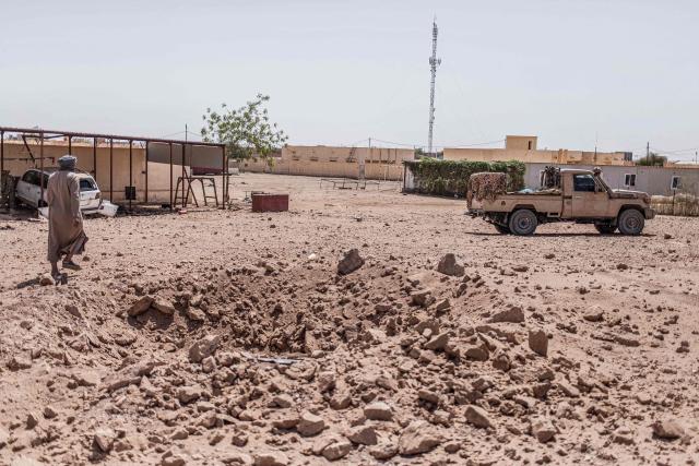A general view of a crater in Kidal on May 14, 2026 caused by aerial bombardment from Malian Armed Forces (FAMA). Strategic towns, including Kidal in the desert north, and Kati, a garrison town near the capital Bamako, were targeted in the April 25 and 26 offensive. Kidal and other towns and villages in the north were captured and are now under the control of the FLA and the jihadists, who have since imposed a blockade on Bamako that continued to disrupt transport. (Photo by AFP)