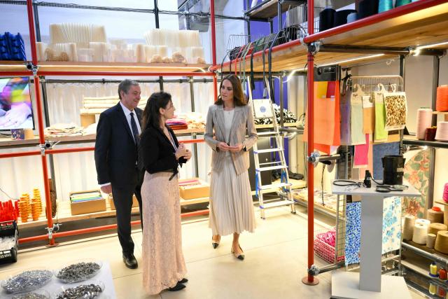 Britain's Catherine, Princess of Wales, visits REMIDA, Reggio Emilia’s creative resource centre, to learn how local businesses and the wider community support early childhood education through the Reggio Emilia Approach, on May 14, 2026. Established in 1996, REMIDA is a cultural project dedicated to sustainability, creativity and the re use of industrial surplus. (Photo by Marco BERTORELLO / POOL / AFP)