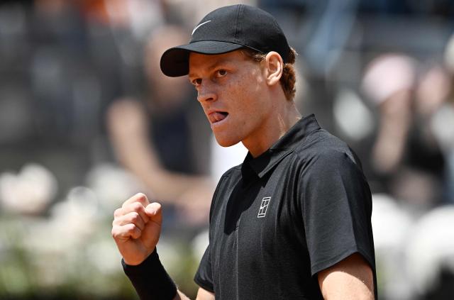 Italy's Jannik Sinner celebrates a point against Russia's Andrey Rublev during the ATP Rome Open tennis tournament at Foro Italico in Rome on May 14, 2026. (Photo by Tiziana FABI / AFP)