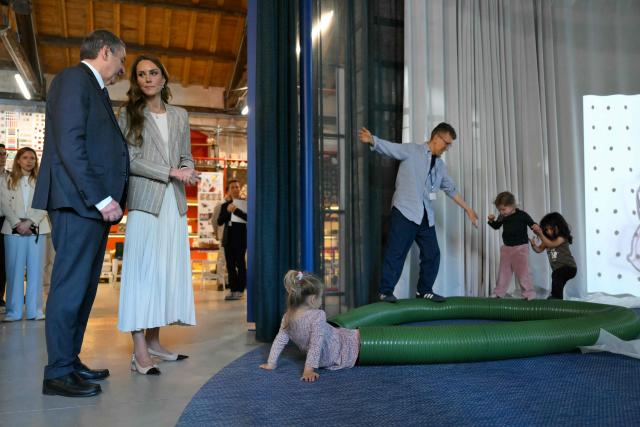 Britain's Catherine, Princess of Wales, visits REMIDA, Reggio Emilia’s creative resource centre, to learn how local businesses and the wider community support early childhood education through the Reggio Emilia Approach, on May 14, 2026. Established in 1996, REMIDA is a cultural project dedicated to sustainability, creativity and the re use of industrial surplus. (Photo by Marco BERTORELLO / POOL / AFP)