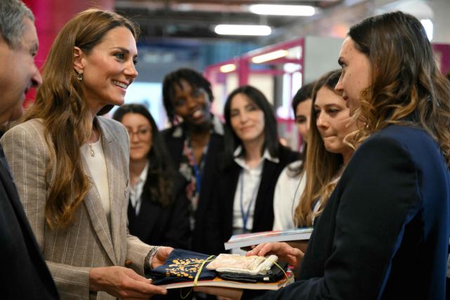 Britain's Catherine, Princess of Wales, visits REMIDA, Reggio Emilia’s creative resource centre, to learn how local businesses and the wider community support early childhood education through the Reggio Emilia Approach, on May 14, 2026. Established in 1996, REMIDA is a cultural project dedicated to sustainability, creativity and the re use of industrial surplus. (Photo by Marco BERTORELLO / POOL / AFP)