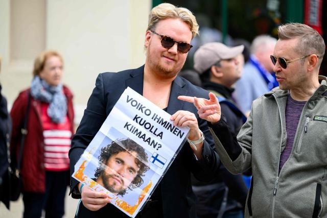 Fans supporting the Finnish entry to the Eurovision Song Contest 2026 (ESC) are pictured in Vienna, Austria on May 14, 2026, before the second semi-final of the contest. (Photo by MAX SLOVENCIK / APA / AFP) / Austria OUT