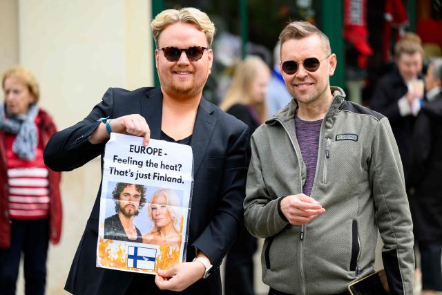 Fans supporting the Finnish entry to the Eurovision Song Contest 2026 (ESC) are pictured in Vienna, Austria on May 14, 2026, before the second semi-final of the contest. (Photo by MAX SLOVENCIK / APA / AFP) / Austria OUT