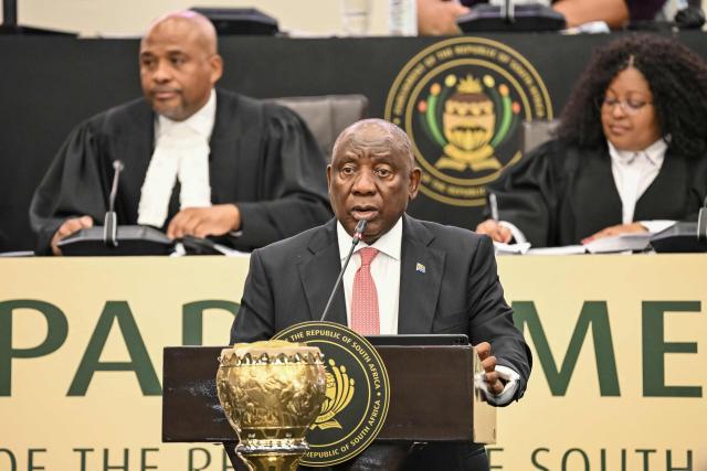 South Africa's President Cyril Ramaphosa answers questions in Parliament in Cape Town on May 14, 2026. (Photo by RODGER BOSCH / AFP)