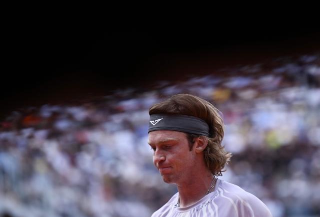 Russia's Andrey Rublev reacts during the match against Italy's Jannik Sinner in their ATP Rome Open tennis tournament at Foro Italico in Rome on May 14, 2026. (Photo by Tiziana FABI / AFP)