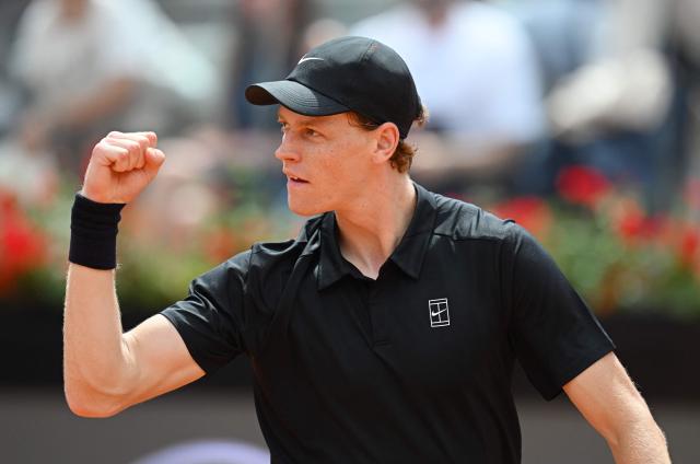 Italy's Jannik Sinner celebrates after winning against Russia's Andrey Rublev during the ATP Rome Open tennis tournament at Foro Italico in Rome on May 14, 2026. (Photo by Tiziana FABI / AFP)