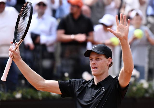 Italy's Jannik Sinner celebrates after winning against Russia's Andrey Rublev during the ATP Rome Open tennis tournament at Foro Italico in Rome on May 14, 2026. (Photo by Tiziana FABI / AFP)