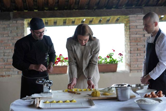 Britain's Kate, Princess of Wales prepares tortelli during her visit to the rural resort ‘Al Vigneto’, part of a two-day trip, in Reggio Emilia, on May 14, 2026. (Photo by Antonio Calanni / POOL / AFP)