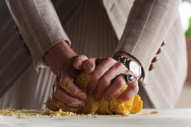 Britain's Kate, Princess of Wales prepares tortelli during her visit to the rural resort ‘Al Vigneto’, part of a two-day trip, in Reggio Emilia, on May 14, 2026. (Photo by Antonio Calanni / POOL / AFP)