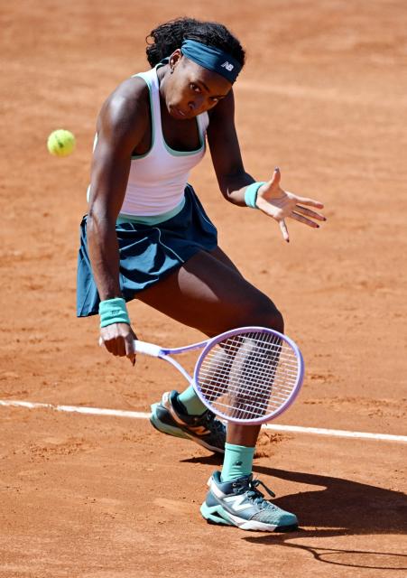 USA's Coco Gauff hits a return to Romania's Sorana Cirstea during the ATP Rome Open tennis tournament at Foro Italico in Rome on May 14, 2026. (Photo by Tiziana FABI / AFP)