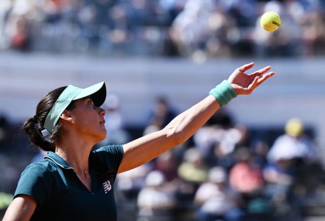 Romania's Sorana Cirstea serves to USA's Coco Gauff during the ATP Rome Open tennis tournament at Foro Italico in Rome on May 14, 2026. (Photo by Tiziana FABI / AFP)