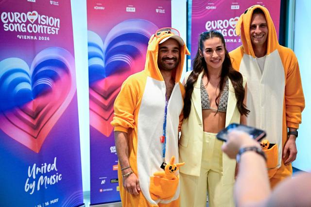 Germany's Sarah Engels (C) poses with fans during a Meet and Greet on the sidelines of the Eurovision Song Contest 2026 (ESC) at the fan village in Vienna, Austria on May 14, 2026, before the second semi-final of the contest. (Photo by Tobias SCHWARZ / AFP)