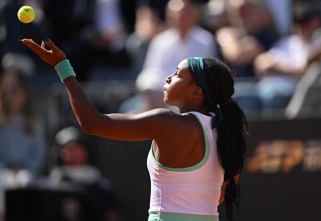 USA's Coco Gauff serves to Romania's Sorana Cirstea during the ATP Rome Open tennis tournament at Foro Italico in Rome on May 14, 2026. (Photo by Tiziana FABI / AFP)
