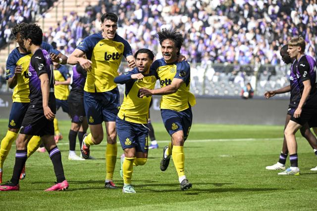 Royale Union Saint-Gilloise's Argentine defender #05 Kevin Mac Allister (R) celebrates with teammates after scoring a goal during the Belgian "Croky Cup" football final match between Royale Union Saint-Gilloise and RSC Anderlecht in Brussels on May 14, 2026. (Photo by Tom Goyvaerts / BELGA / AFP) / Belgium OUT